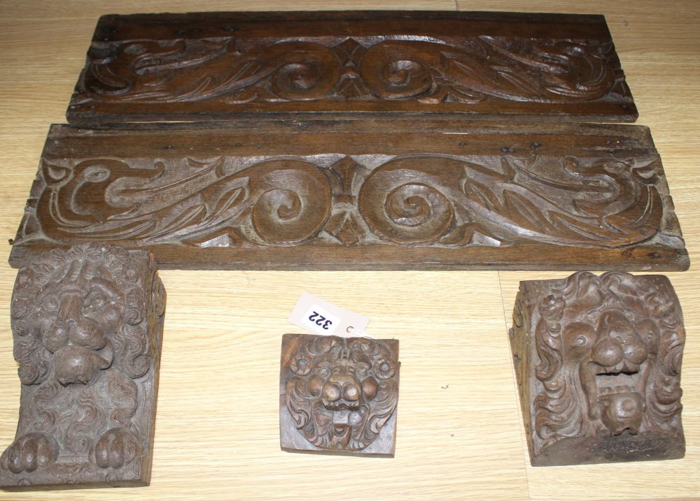 Three 19th century Continental carved oak corbels, carved with lion masks and a pair of scroll and dragon carved frieze panels